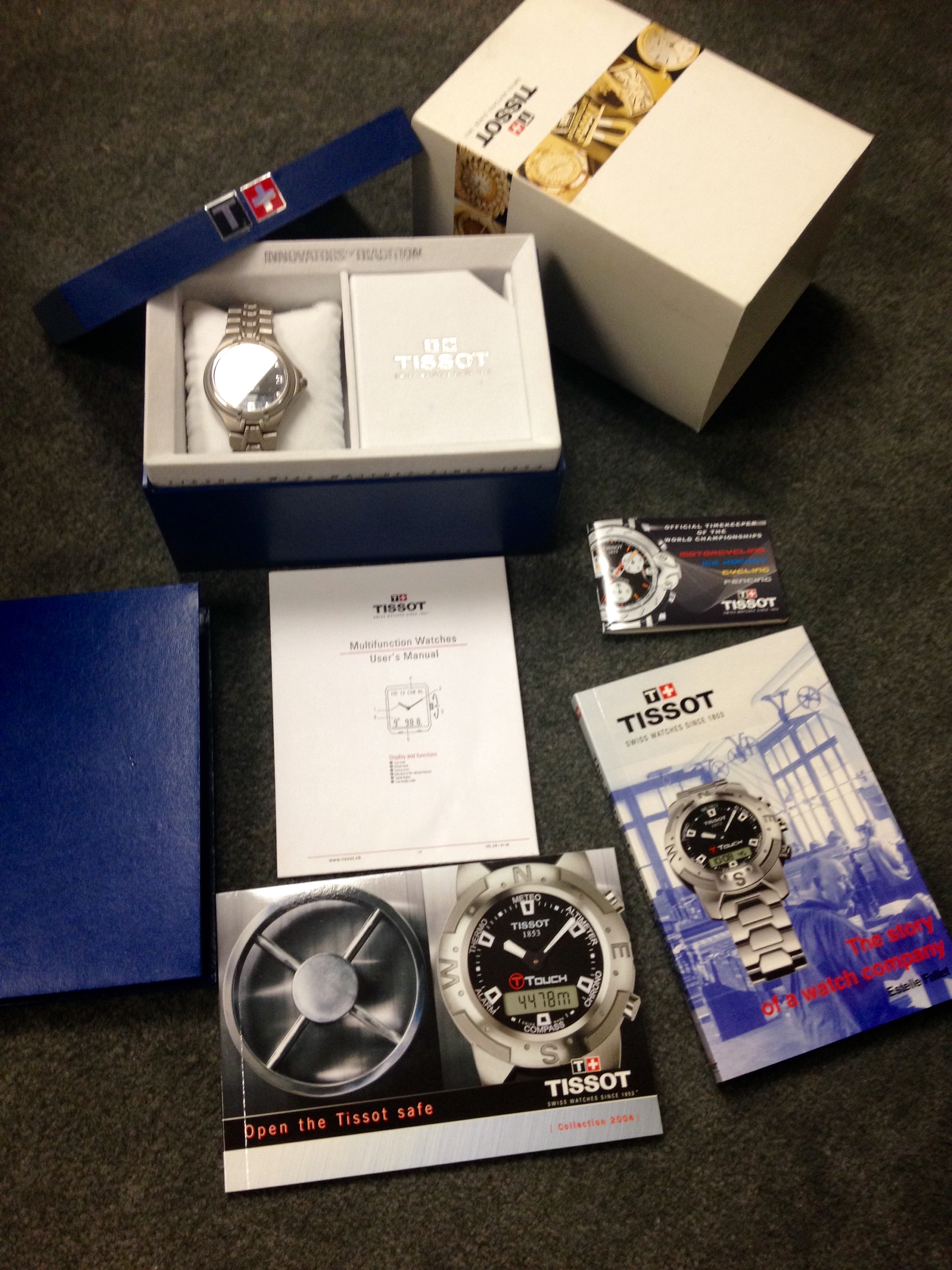 FSOT TISSOT TITANIUM T690K with box and manuals WatchCharts