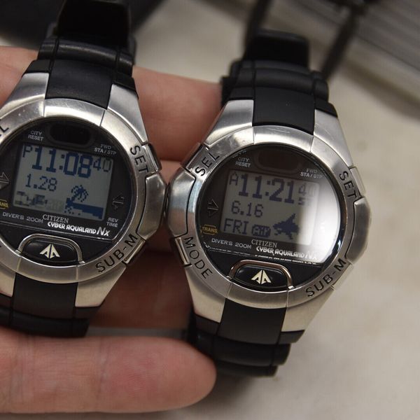 2 Citizen Cyber Aqualand Nx Divers Watches w/Manual,CD, Charger