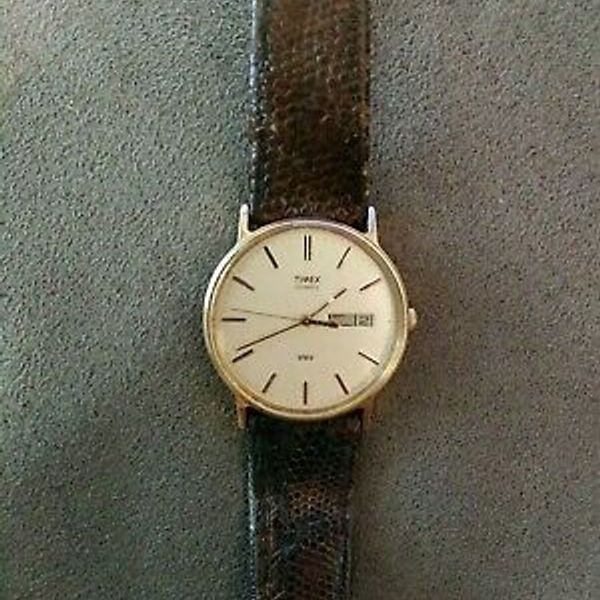 Timex quartz water resistant day date watch LA cell Philippines T14 vintage  mens | WatchCharts