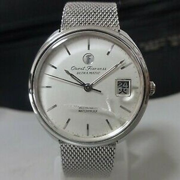Orient Fineness day/date Ultramatic 35 jewels SS World