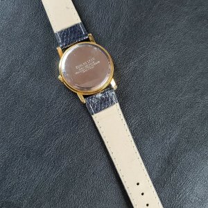 RARE MONTRE HOMME Sandoz President à quartz date index romain cadran