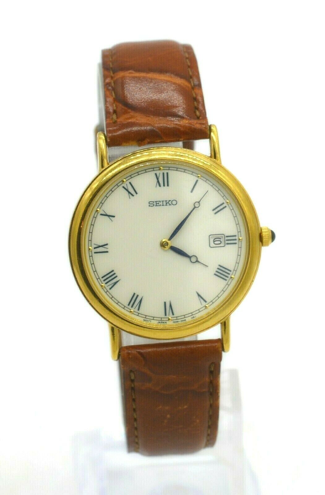 VINTAGE SEIKO QUARTZ MEN S GOLD TONE WATCH WITH BROWN LEATHER BAND