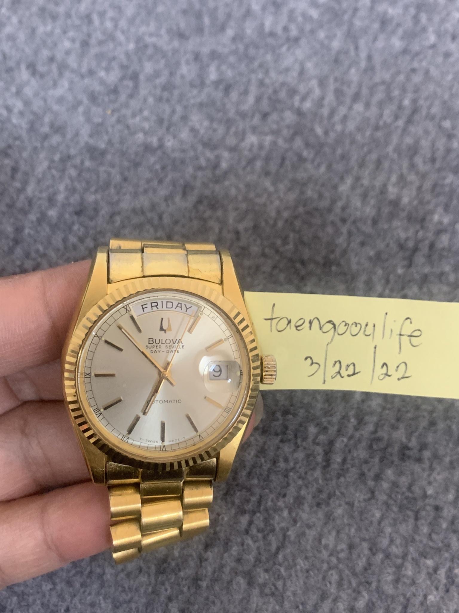 Bulova day date gold best sale