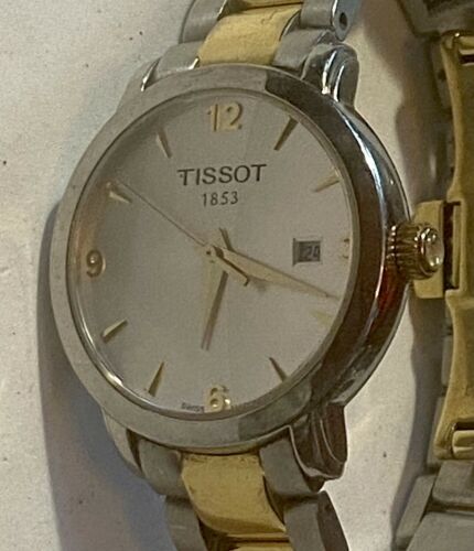 TISSOT Swiss ladies SS running watch T057210. A WatchCharts