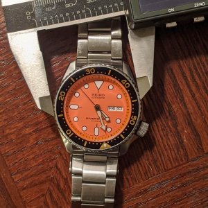WTS] Seiko SKX-011 ; English/Arabic date wheel; steel bracelet |  WatchCharts