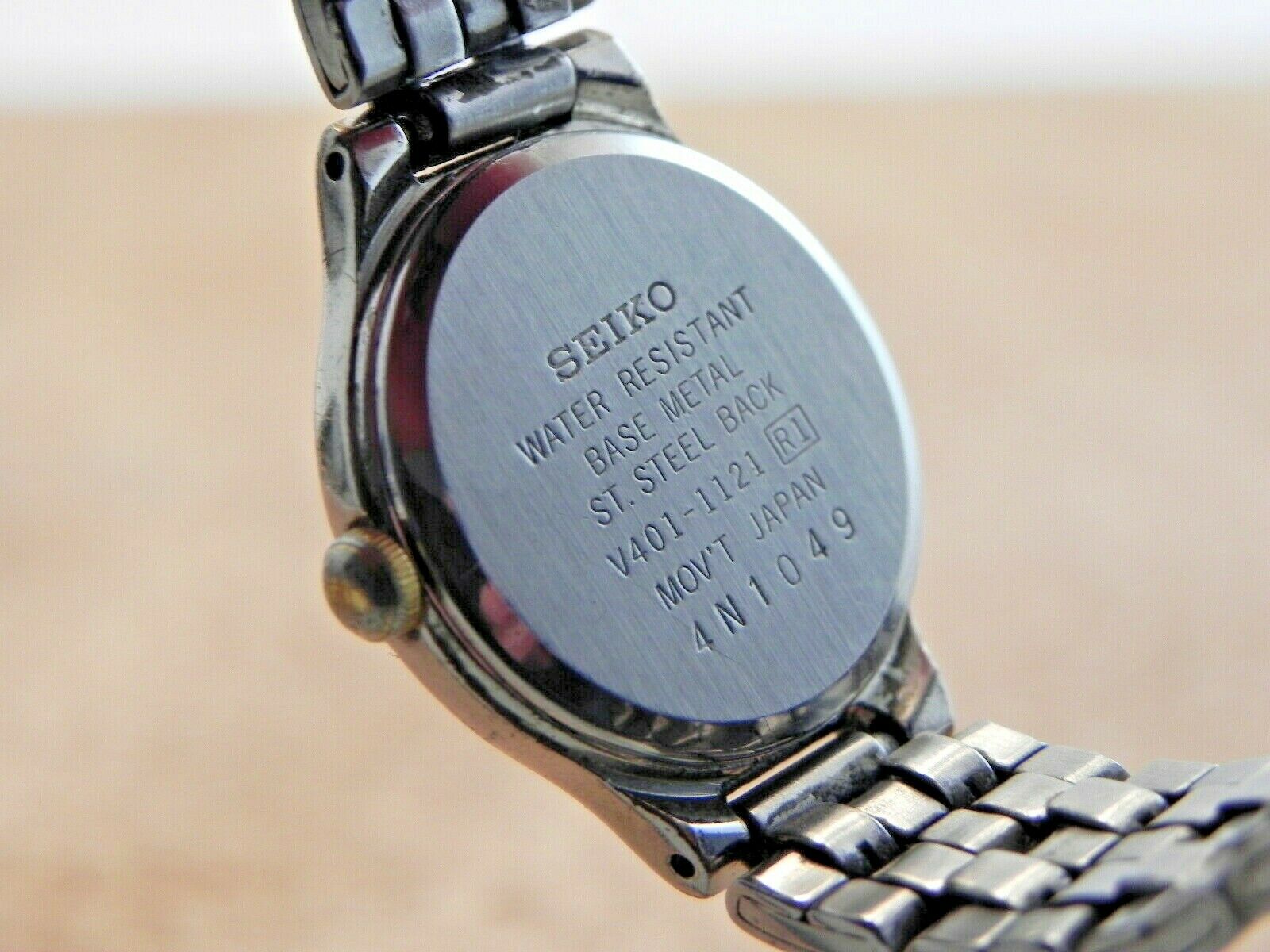 Woman's Seiko V401-1121 Wrist Watch-New Battery-Two Tone-H2O Woman's Seiko V401-1121 Wrist Watch-New Battery-Two Tone-H2O