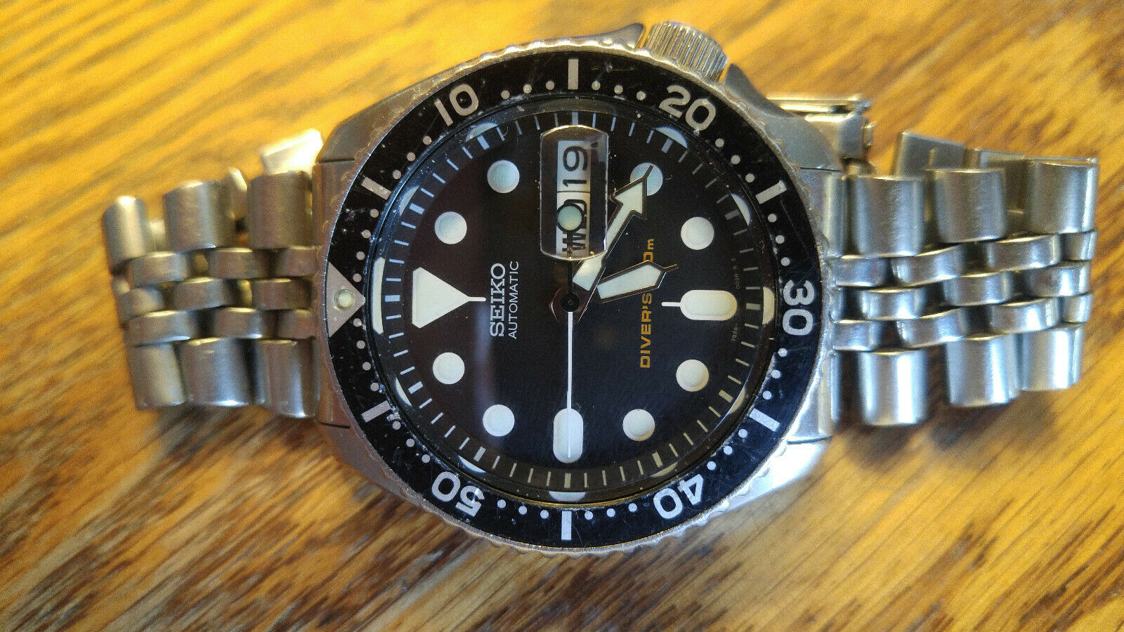 Seiko SKX007 with Sapphire Crystal with Day/date cyclops | WatchCharts