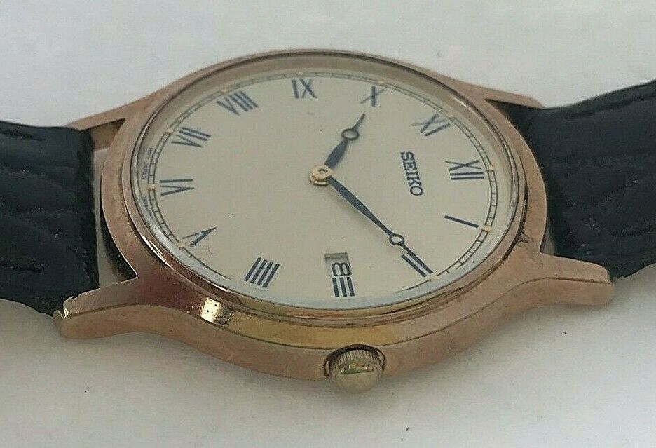 Vintage Seiko Quartz mens date watch with roman numerals ref