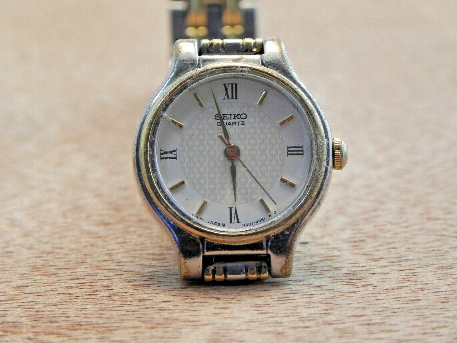 Woman s Seiko V401 1121 Wrist Watch New Battery Two Tone H2O