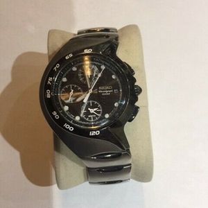 Seiko Alarm Chronograph 7T62-0AM0 Unique Asymmetrical Design Men's |  WatchCharts