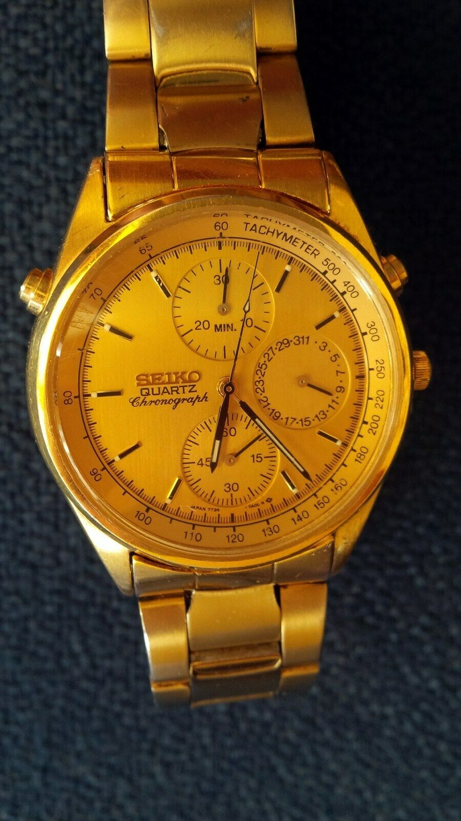 Seiko men's wrist watch quartz chronograph, model 7T24-7A00 gold tone |  WatchCharts