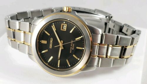 Seiko V742 8119 Men s Two Tone Stainless Steel Black Dial Watch