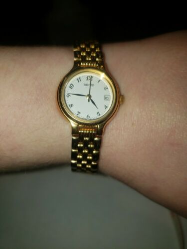 Vintage Seiko womans gold tone watch 7N82-0228, -0011, band