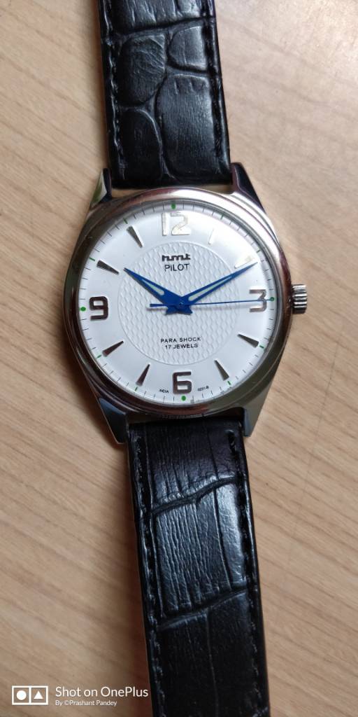 white dial blue hands