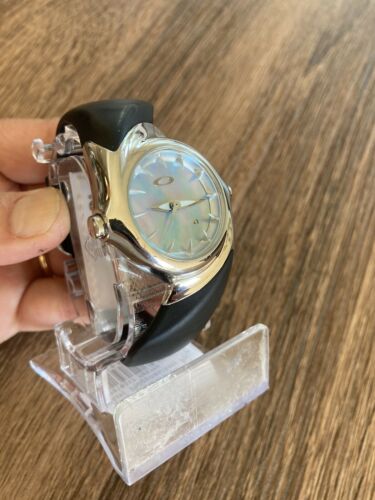 Rare Oakley Women's Crush watch Unobtainum band with mother of