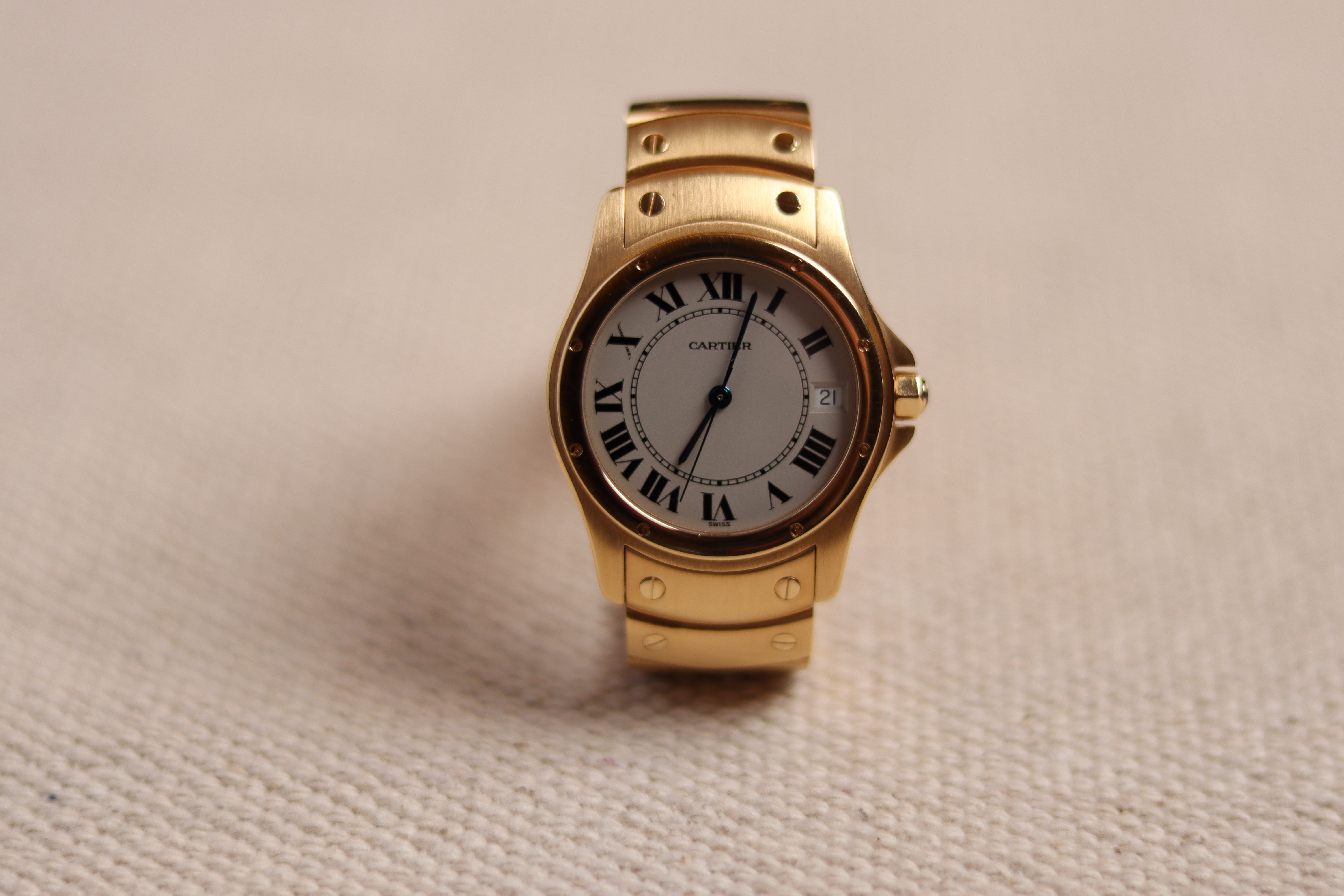 Cartier santos hotsell ronde gold