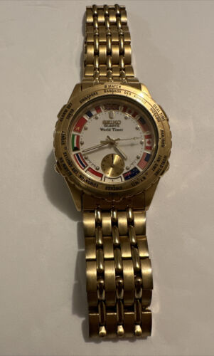 Vintage GOLD SEIKO QUARTZ WORLD TIMER 8V22 7008 Mens Watch