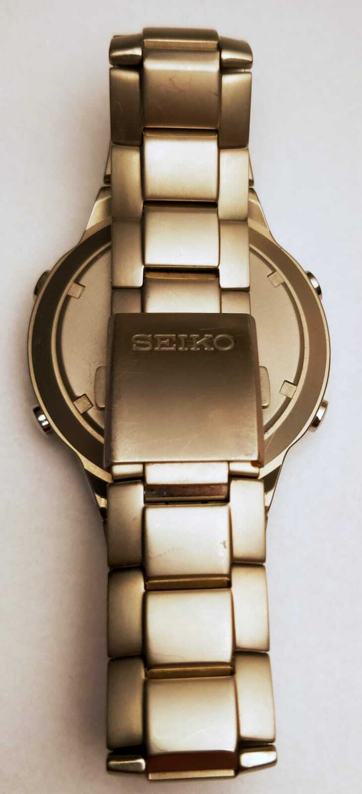 SEIKO H023-00D0 Analog & Digital TITANIUM Chrono Alarm World Time