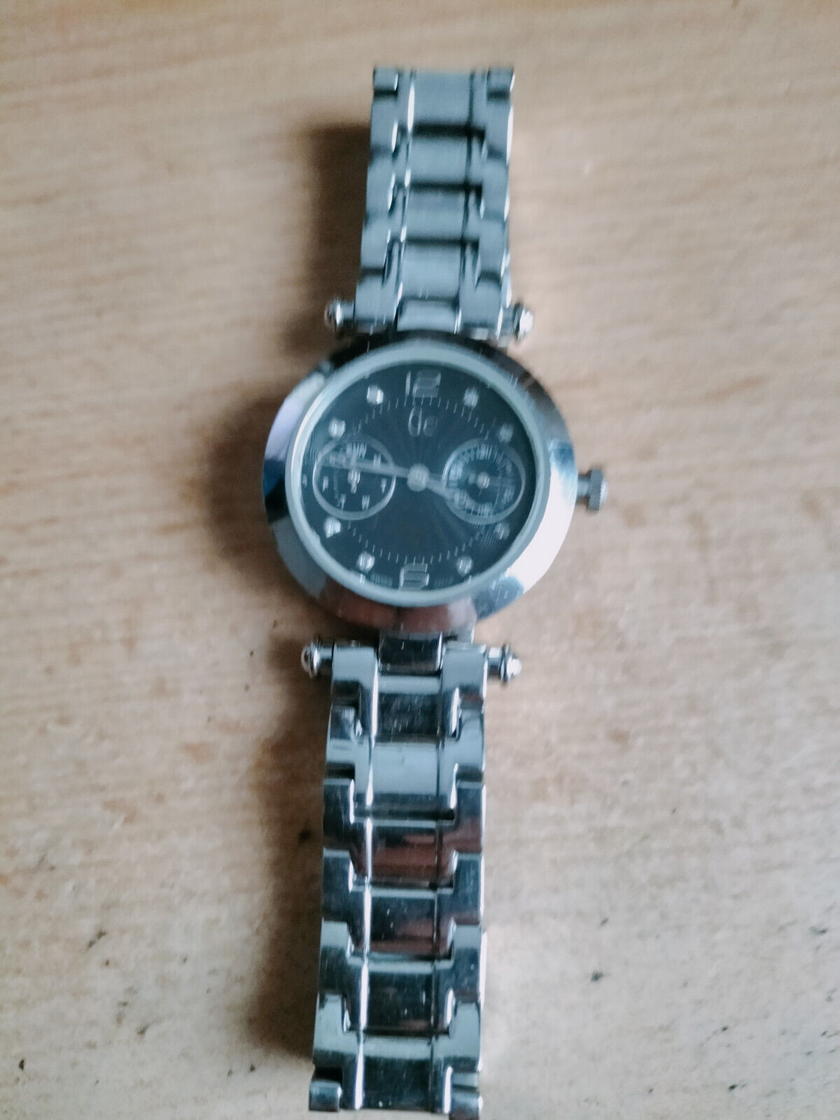 Montre Femme Guess Collection Modèle GC6000 - Cadran Noir Argenté - Occasion