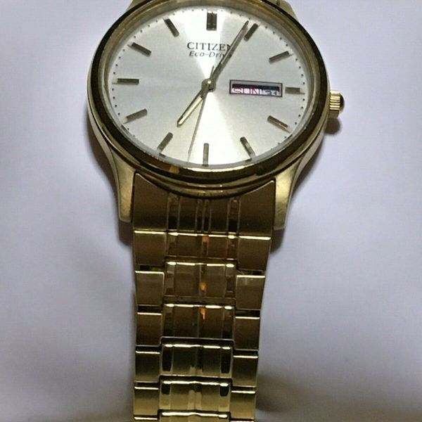 CITIZEN Eco Drive Wrist Watch E101Gold ToneDay DateRuns Well