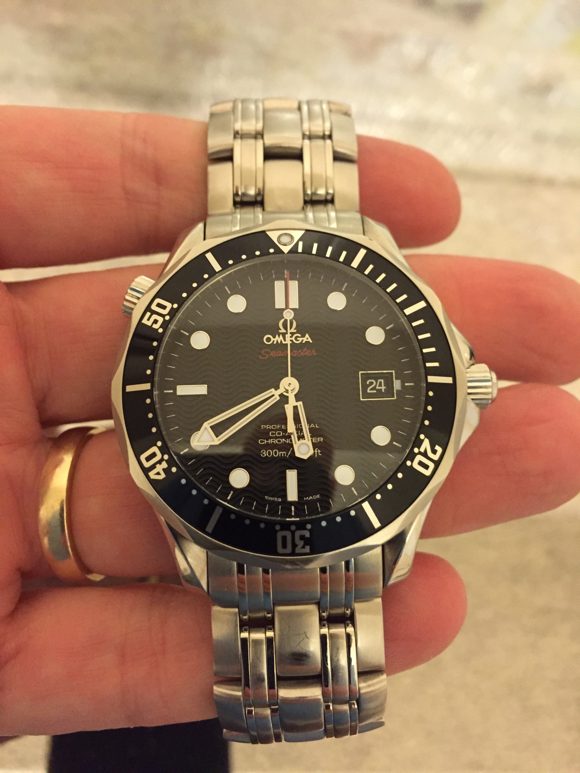 omega seamaster black wave dial