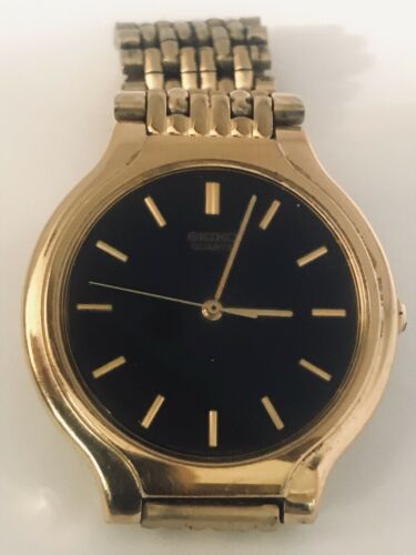 Men s Seiko Quartz Dress Watch Gold Tone V701 6K69 Black Face