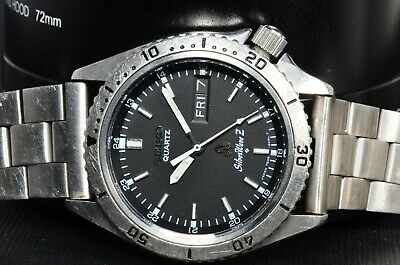 Seiko 7546-6050 Silverwave Quartz dive watch works well, looks