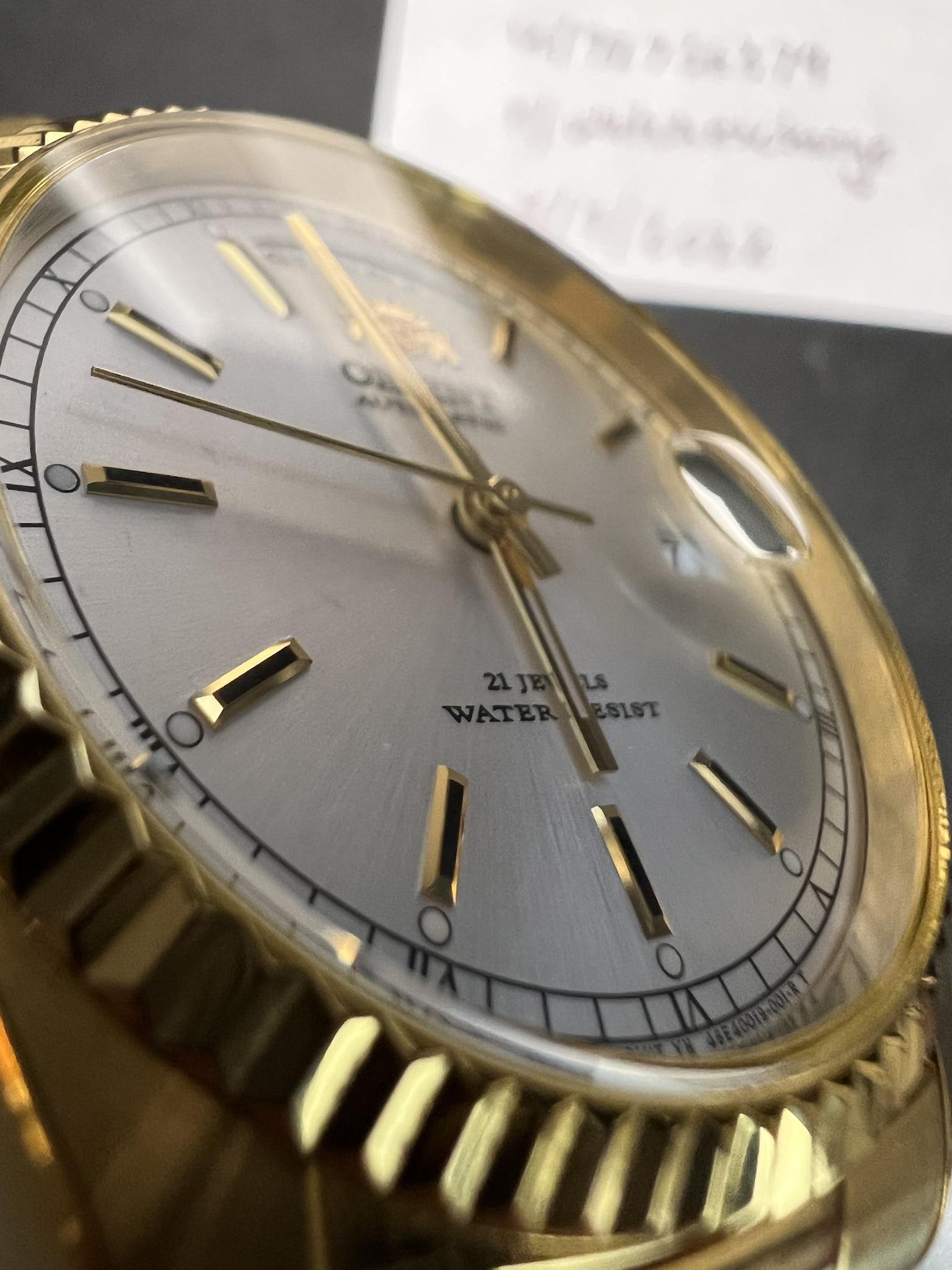 orient day date baton hands
