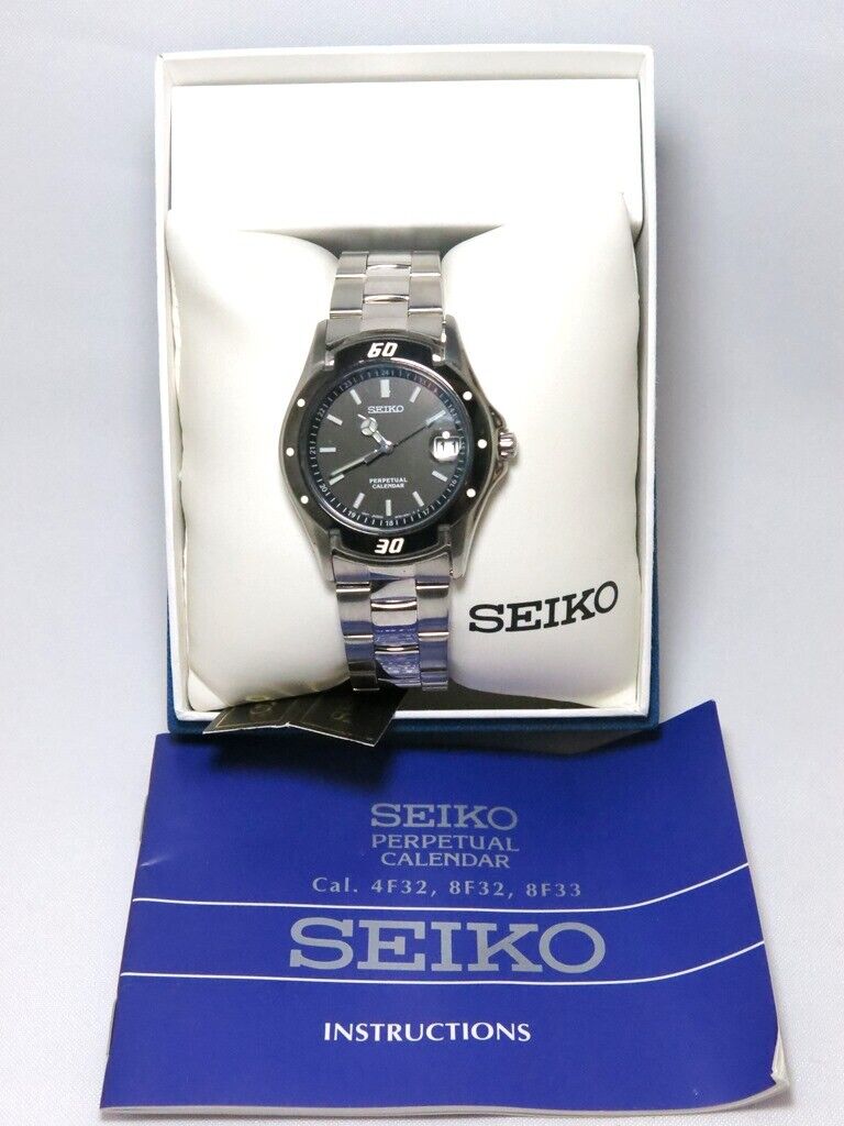 N.O.S Vintage SEIKO 8F32 0069 50m Date Quartz Watch Black Dial