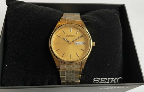 SEIKO Men s Gold Tone Stainless Steel Day date WATCH SUR434