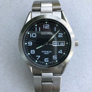 SEIKO SGG711 TITANIUM QUARTZ WATCH BOX PAPERS NEEDS BATTERY DISCONTINUED  MODEL | WatchCharts