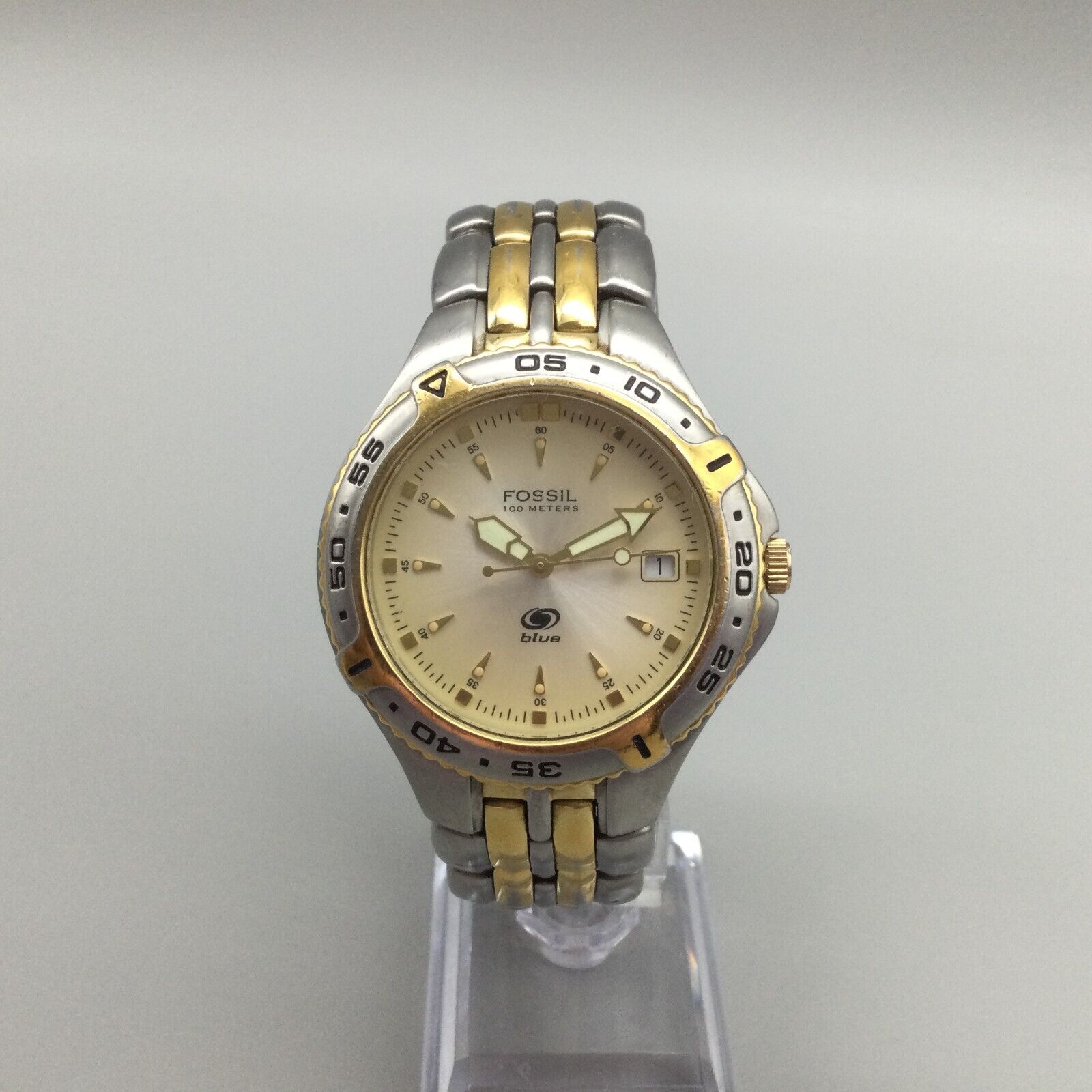 Fossil 100 hotsell meters gold