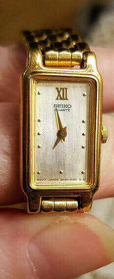 SEIKO WOMENS MODEL 2E20-6859 GOLD TONE WATCH WITH MOP DIAL  display picture 1