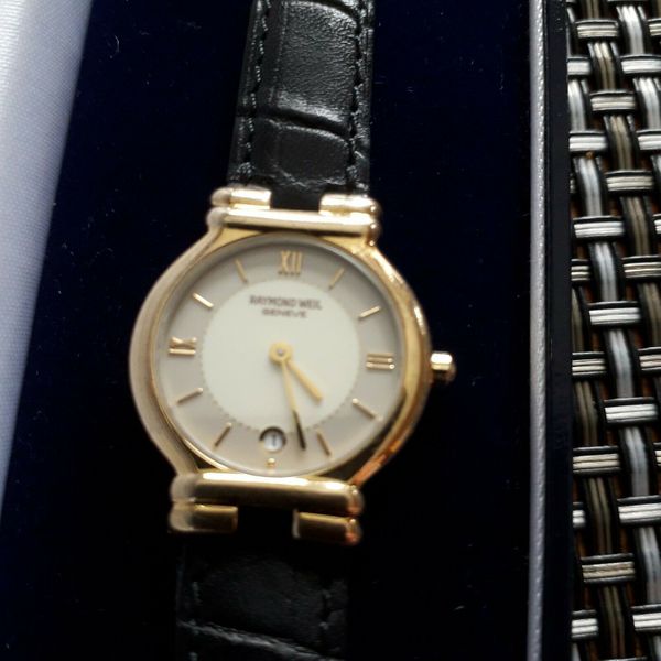 raymond weil ladies 18 kt gold electroplated watch serial number 9932 ...