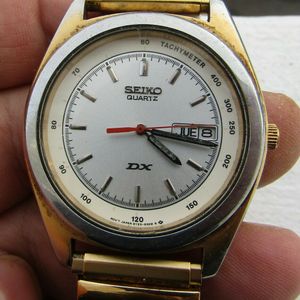 Seiko Quartz DX 5Y23-8230 for parts not running | WatchCharts