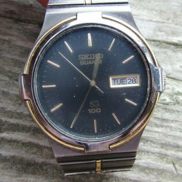 Vintage SEIKO SQ 100 6923-6070 Black Dial Gold Trim Men's Watch ...