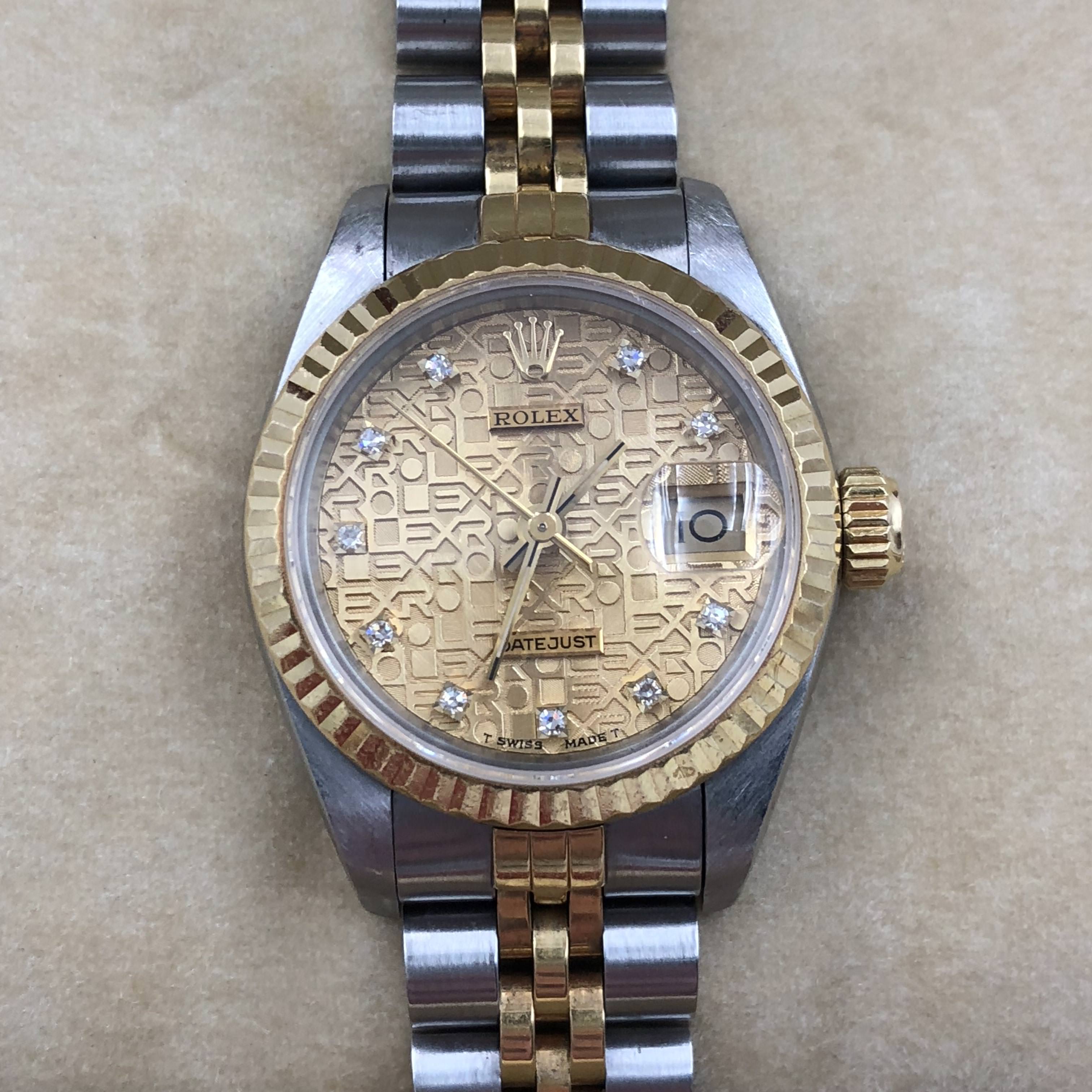 rolex datejust computer face with diamonds