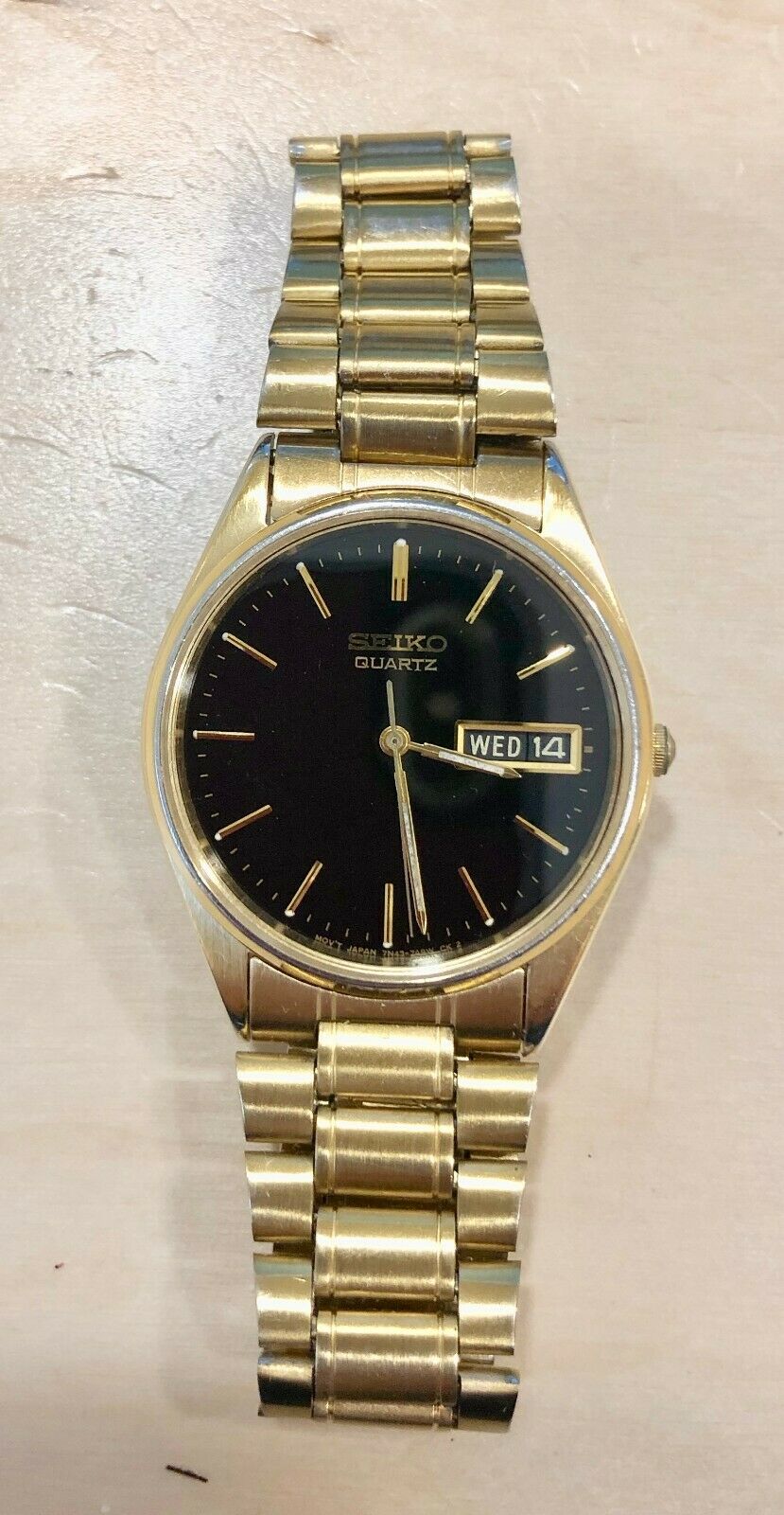 Gents Seiko Quartz 7N43-7A50 Gold tone case black dial | WatchCharts