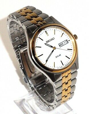 SEIKO SOLAR 195 MEN S TWO TONE DRESS WATCH LUMINOUS HANDS DAY