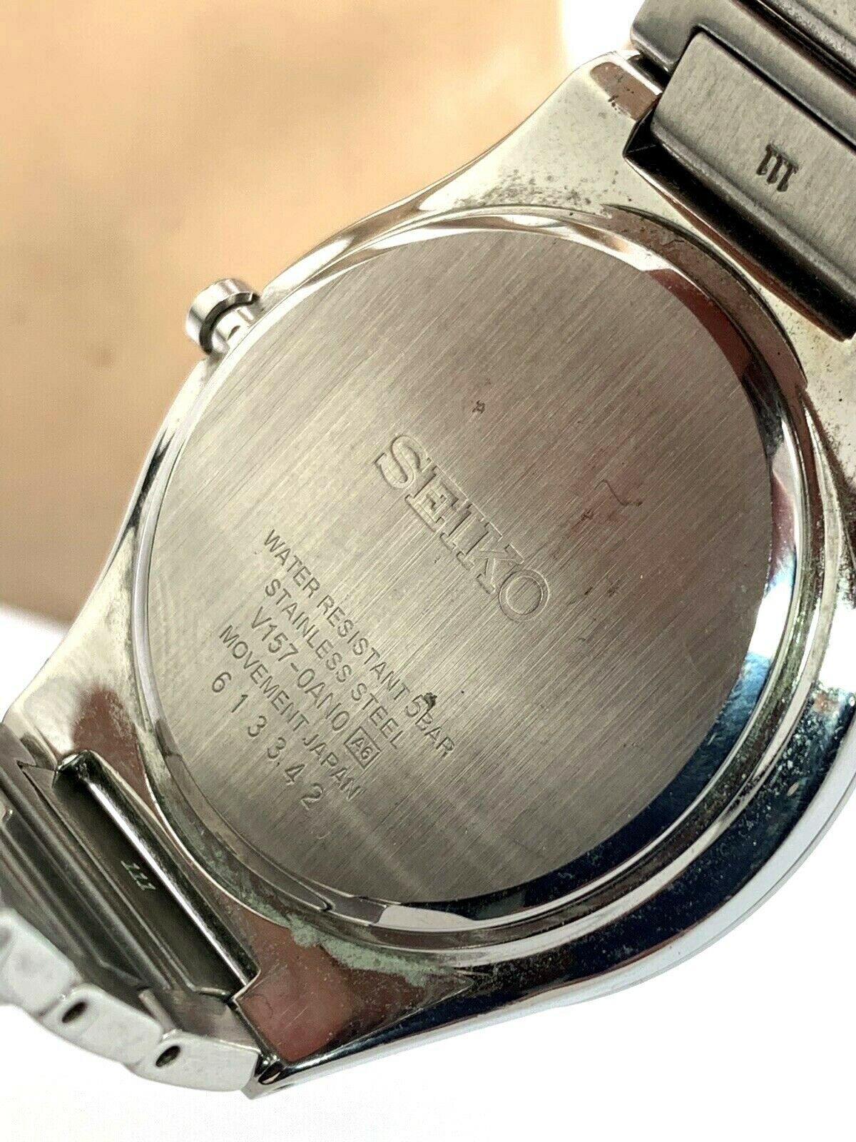 Seiko Solar Black Dial Date Silver Tone Stainless Steel Men's