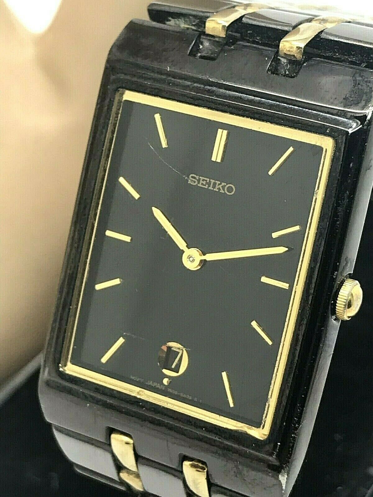 Seiko Quartz Two Tone Gold & Black Steel Men's Watch Black Dial 7N39-5A29  USED | WatchCharts