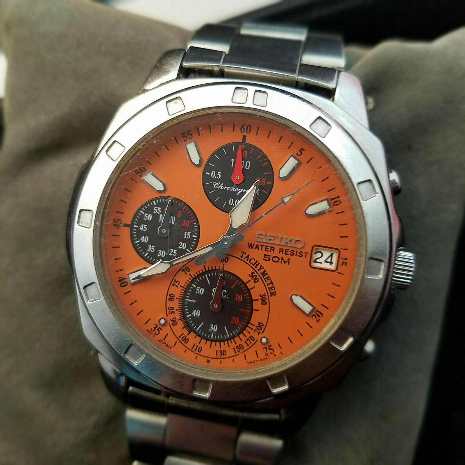 Seiko Men's Chronograph Orange Face Quartz Sports Watch V657 Seiko Men's Chronograph Orange Face Quartz Sports Watch V657