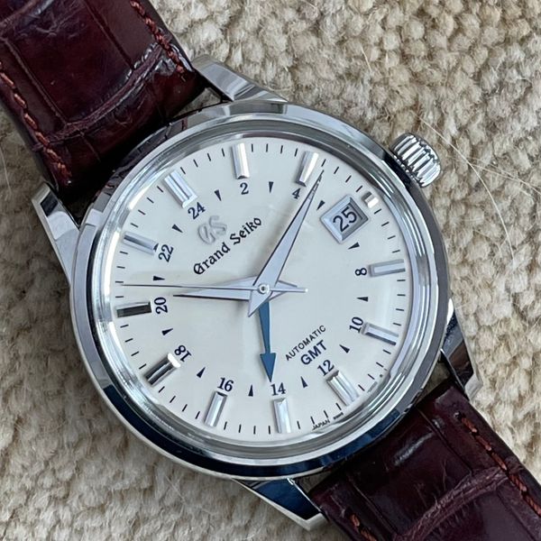 Grand Seiko SBGM221 GMT | WatchCharts