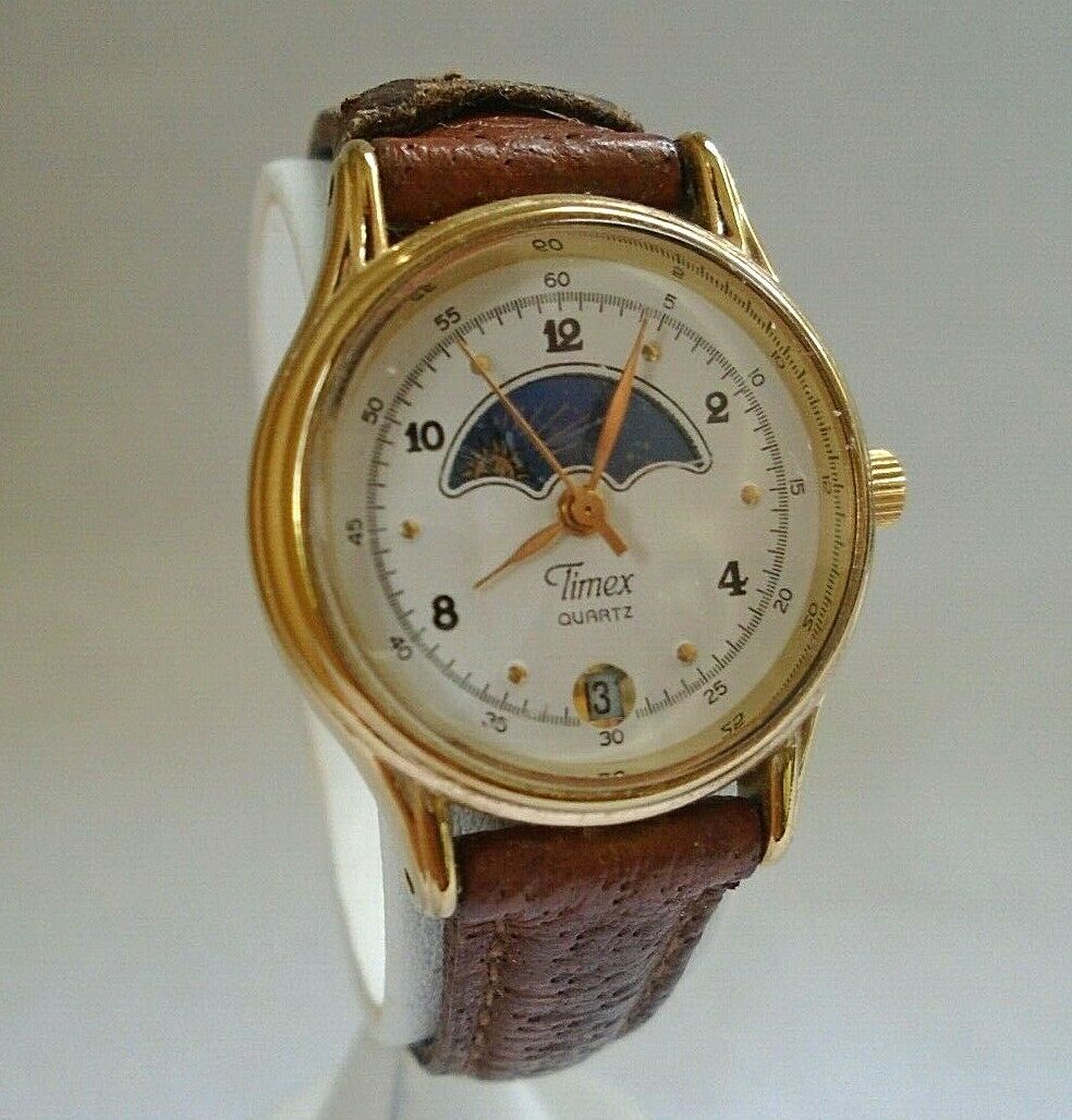 Vintage Timex Water Resistant 364 T Cell Quartz Sun Moon Phase Date Round  Watch | WatchCharts