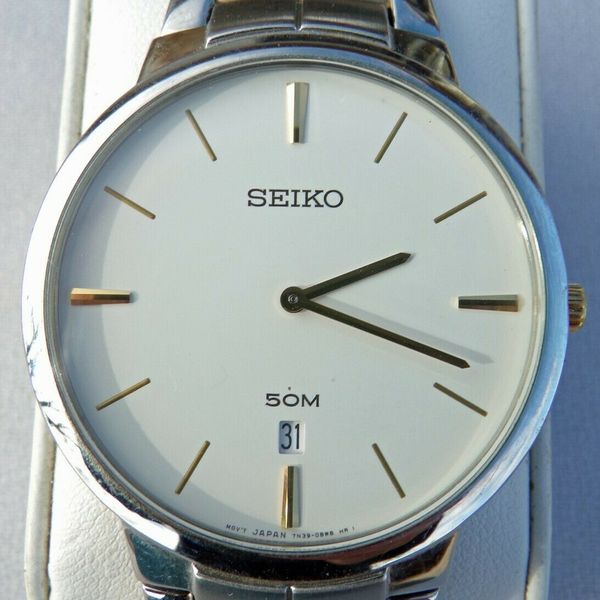 Seiko 7N39-OBHO Wristwatch Stainless Steel Band & White Dial Date |  WatchCharts