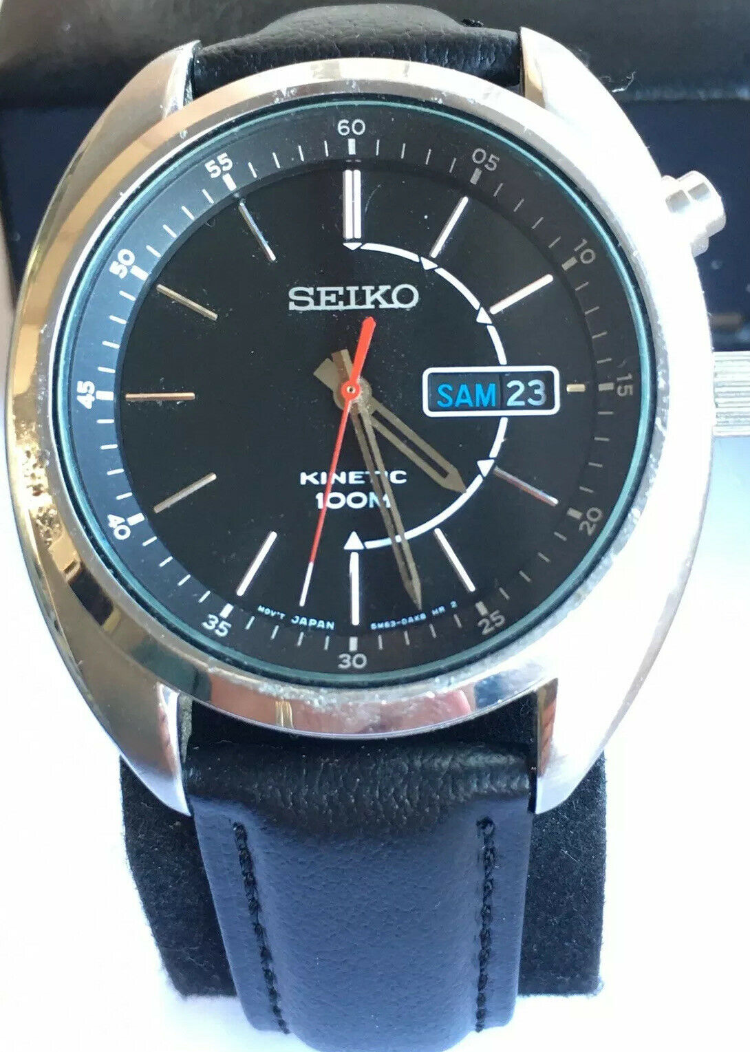 Seiko Kinetic 5M63-0AK0 100m Day Date Men's Watch With Black Leather Strap  | WatchCharts