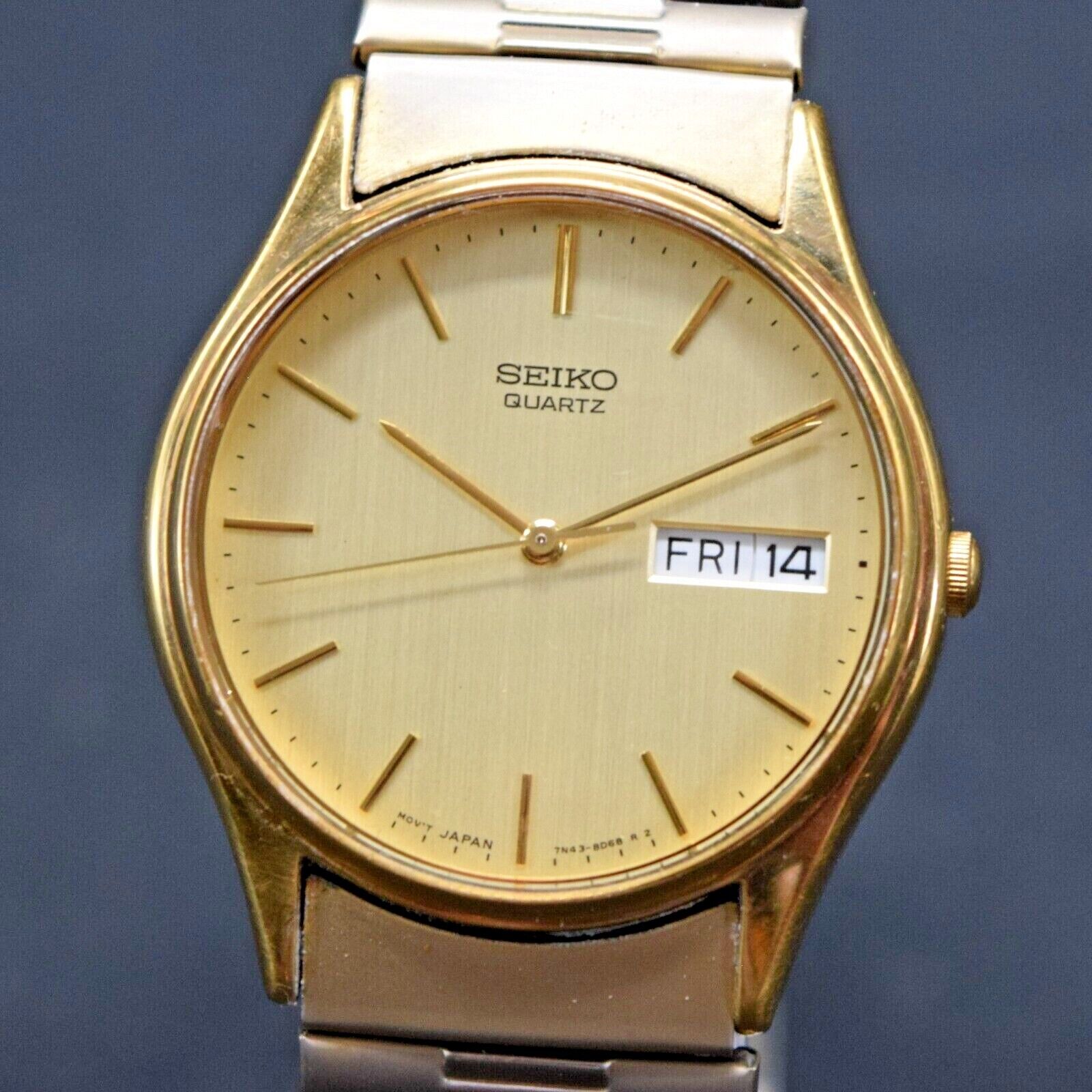 Elegant Seiko 7N43 8A89 Men s Gold Tone Quartz Wristwatch w