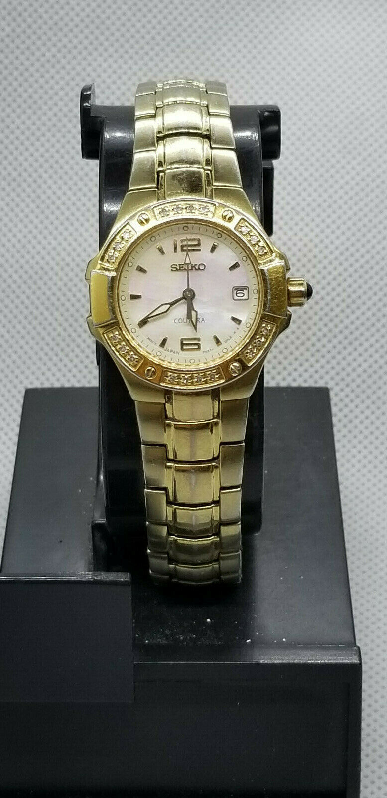 Seiko Women s 7N82 0CG0 Coutura Diamond Gold Tone Pink Mother of