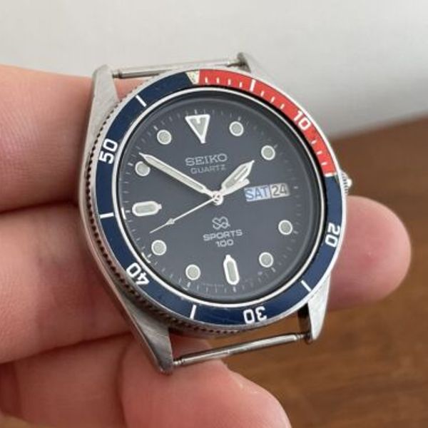 Vintage Seiko 8123-6109 Quartz SQ Sports 100 Pepsi Day Date