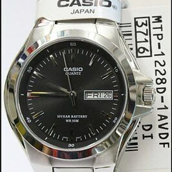 MTP-1228D-1A Black Water Resist Day Date Casio Men's Watch 10-Year Quart | WatchCharts